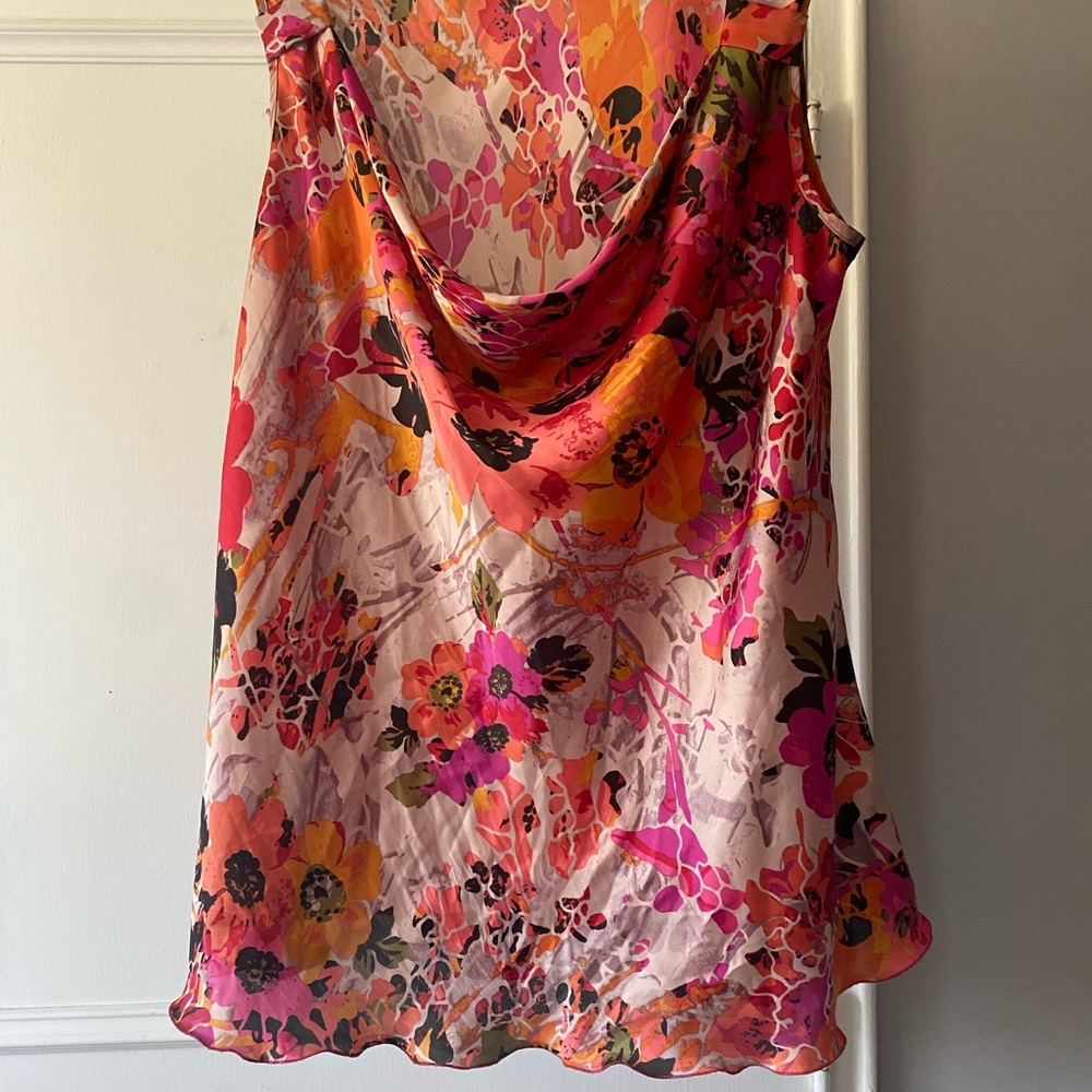 Vibrant Pink and Orange Sleeveless Blouse with Elegant Design